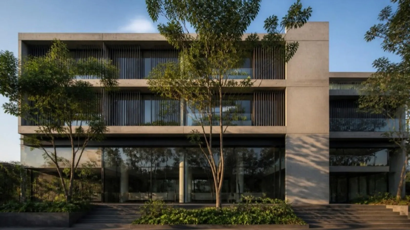 Illustration: a four-storey office building in concrete and glass